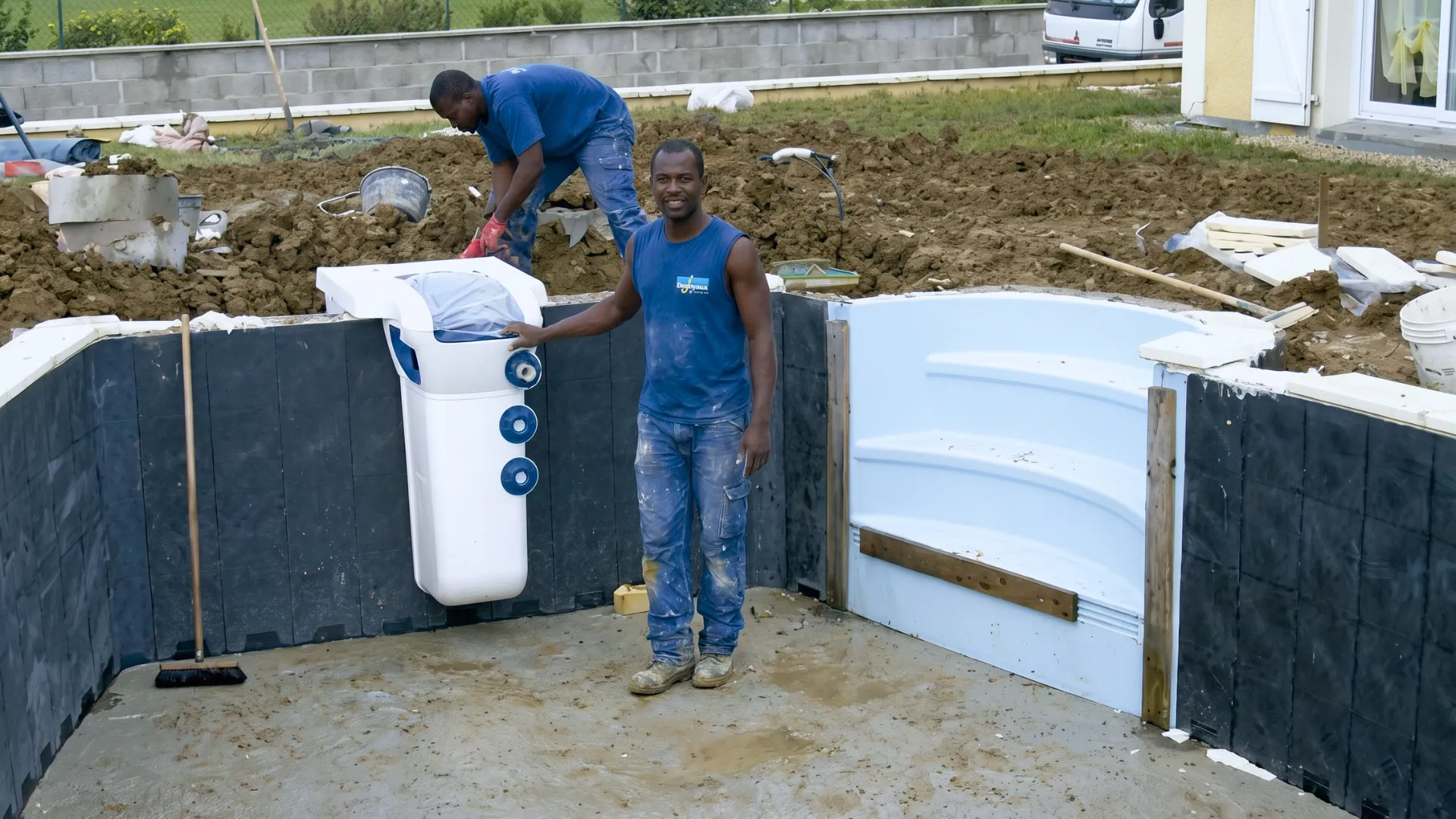 Desjoyaux technicians installing a pool filtration unit on site